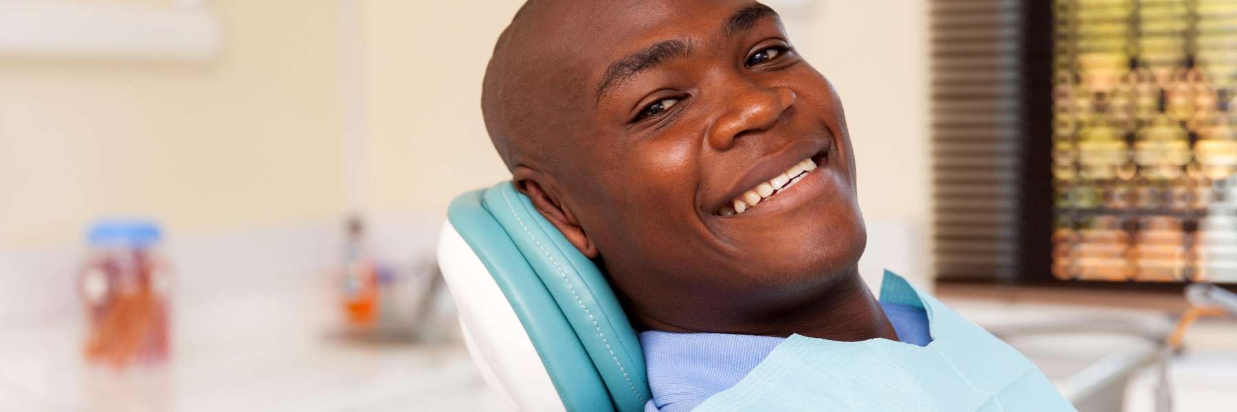 Patient smiling in treatment chair at dentist for BOTOX in Brandon, FL